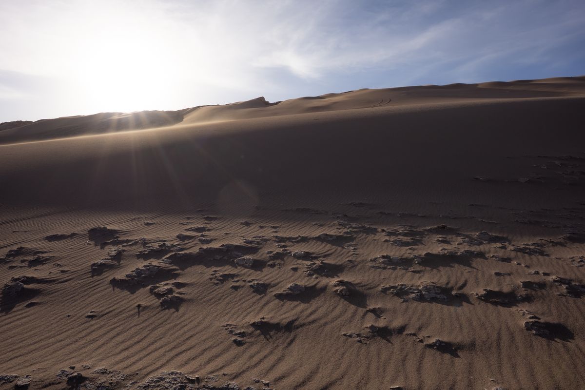 Sample image taken with the Sigma 15mm f/1.4 DC Contemporary showing sun flare over hills