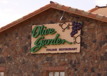 The outside of an Olive Garden restaurant, which is owned by Darden