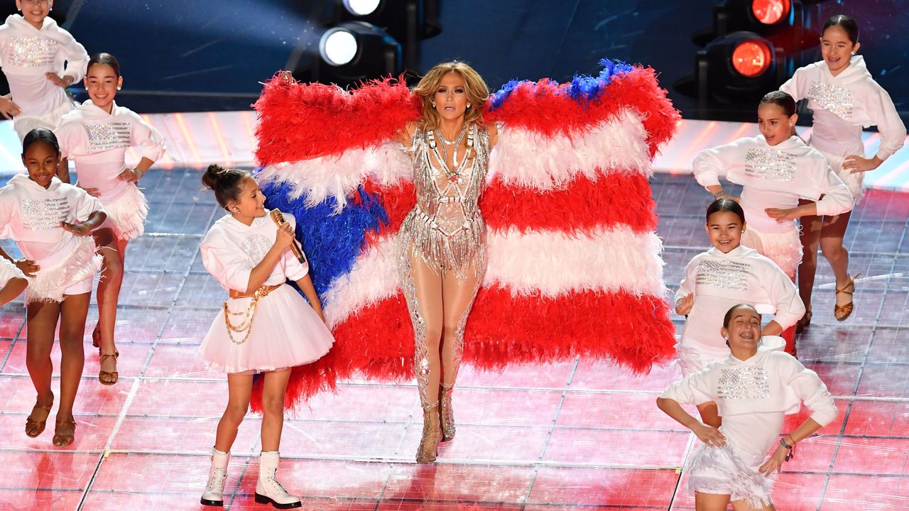 US singer Jennifer Lopez and her daughter Emme Muniz (L) perform during the half-time show of Super Bowl LIV between the Kansas City Chiefs and the San Francisco 49ers at Hard Rock Stadium in Miami Gardens, Florida, on February 2, 2020.