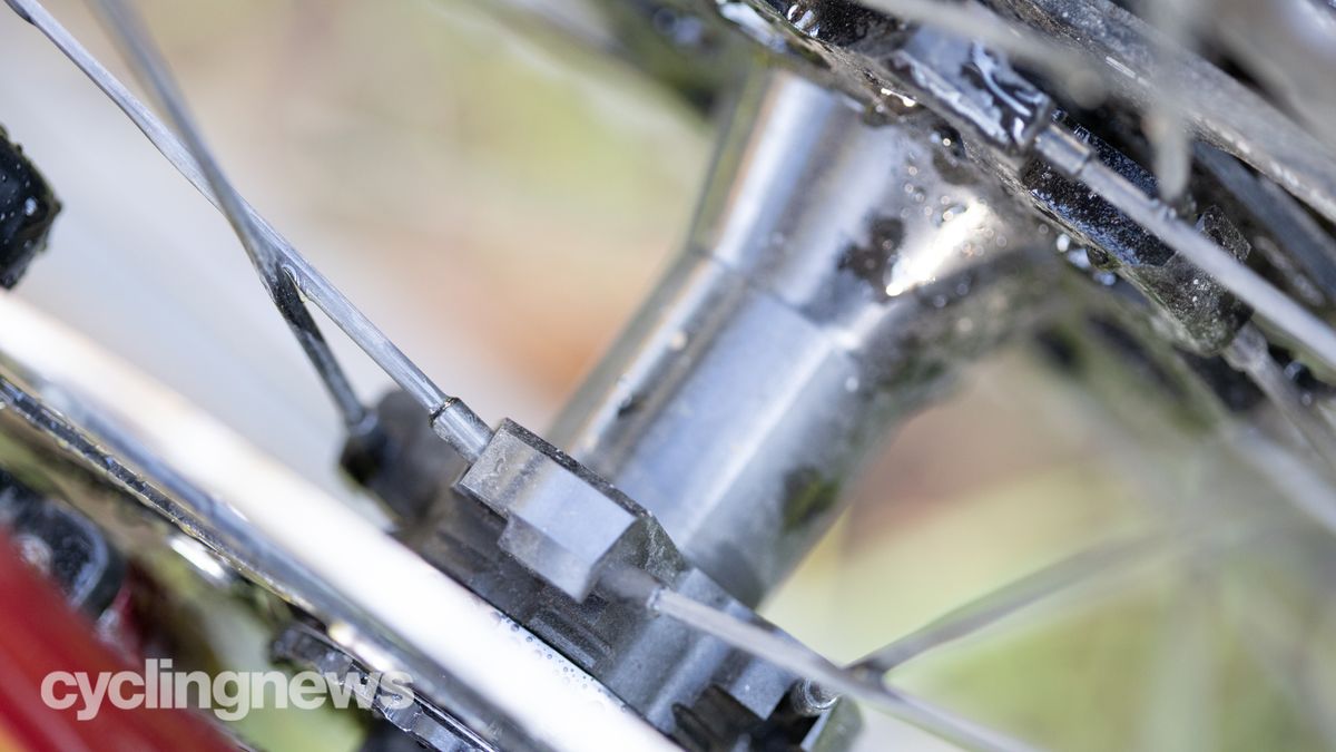 A close up of a black bike hub