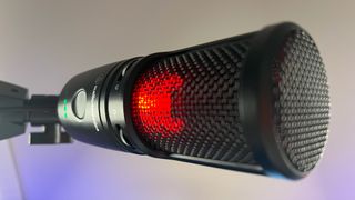 Audio-Technica AT2020USB-XP on mute, showing the red indicator light