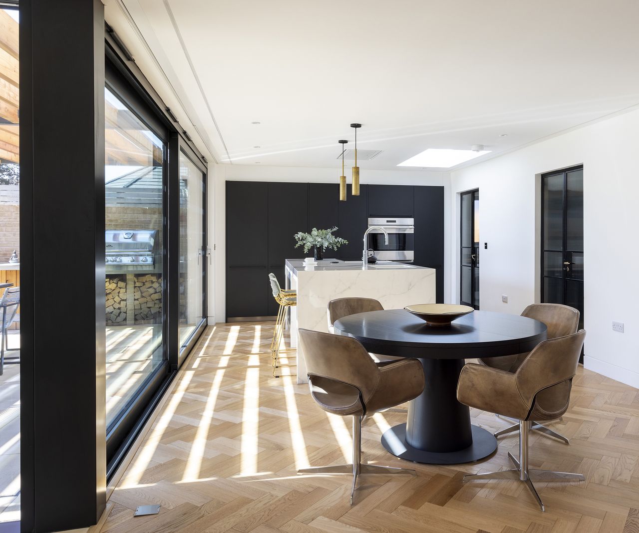 Open plan kitchen and dining space in a contemporary bungalow renovation