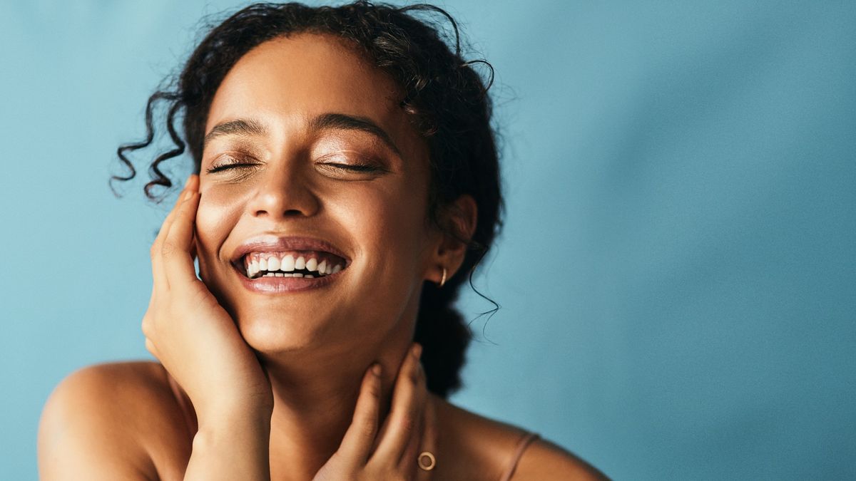 Radiant young woman with glowing skin