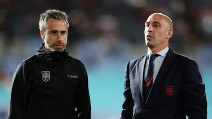 Spanish Women's Football coach Jorge Vilda advises a player during the Women's World Cup