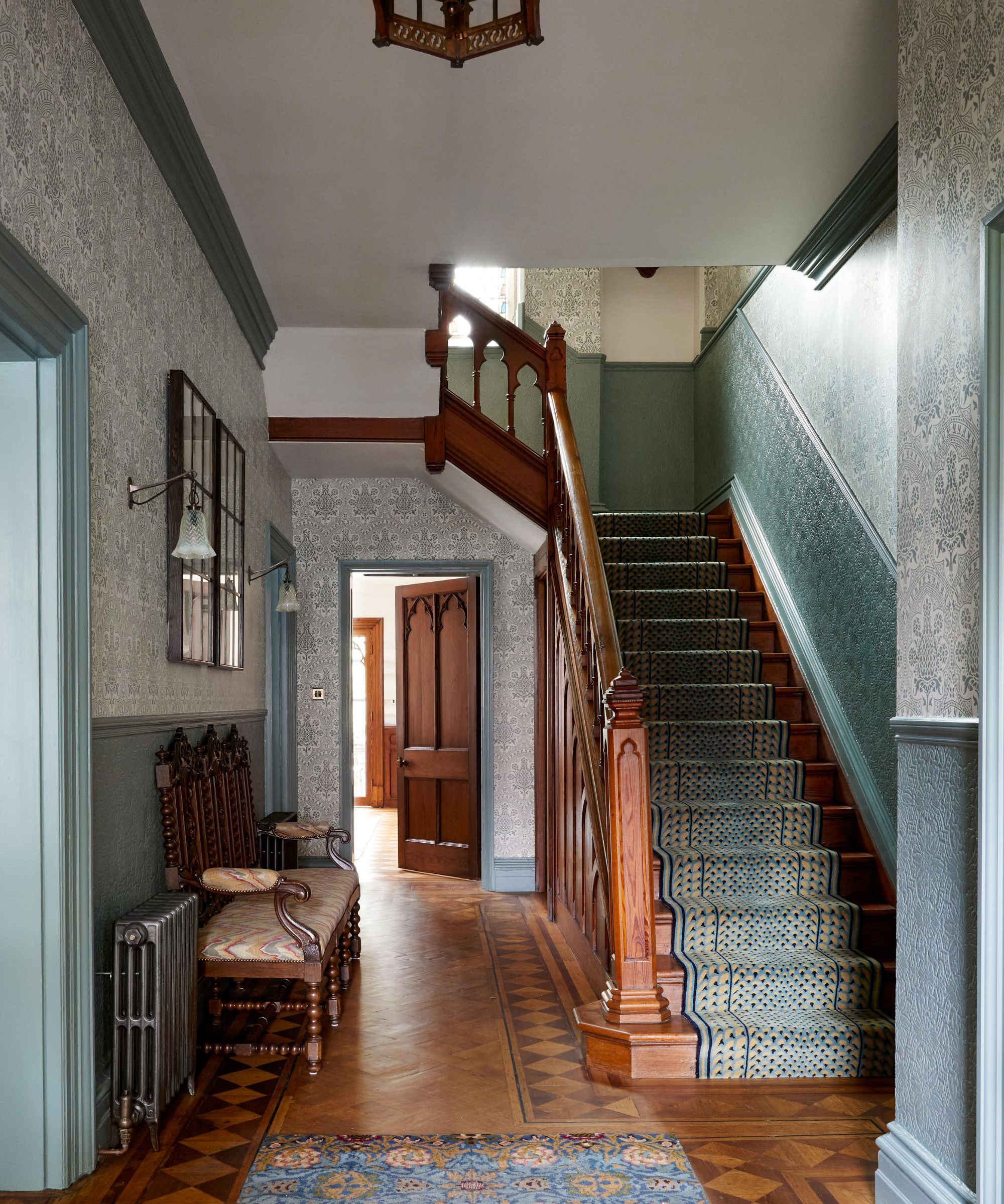 Gothic home with original wooden staircase