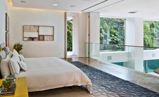 Swimming pool with side bedroom