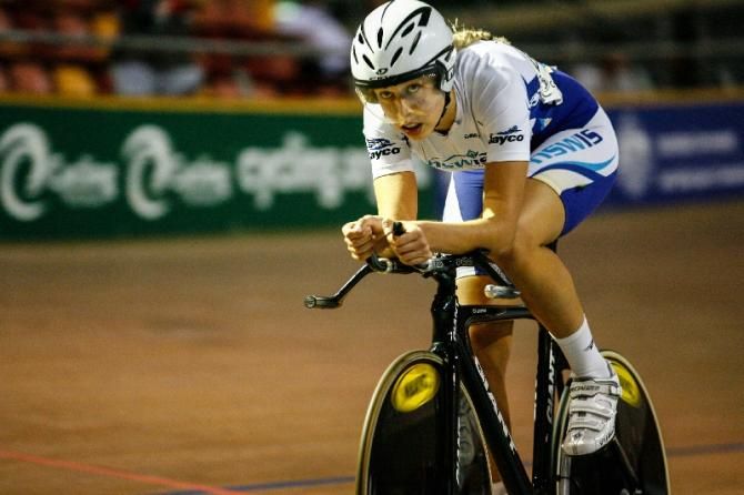 Josie Talbot keeps an eye on the clock in the junior women's time trial