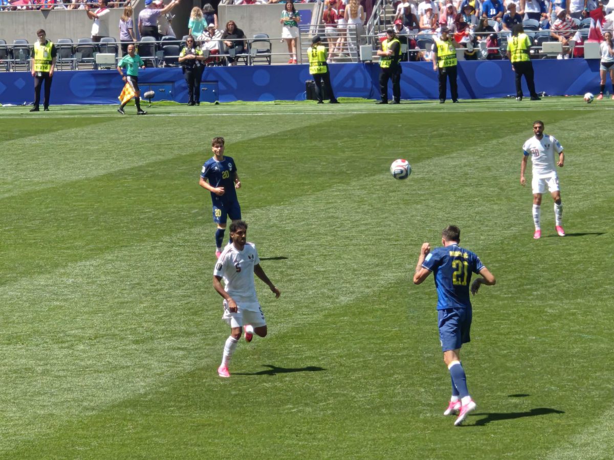 A ball bouncing off a soccer player's head