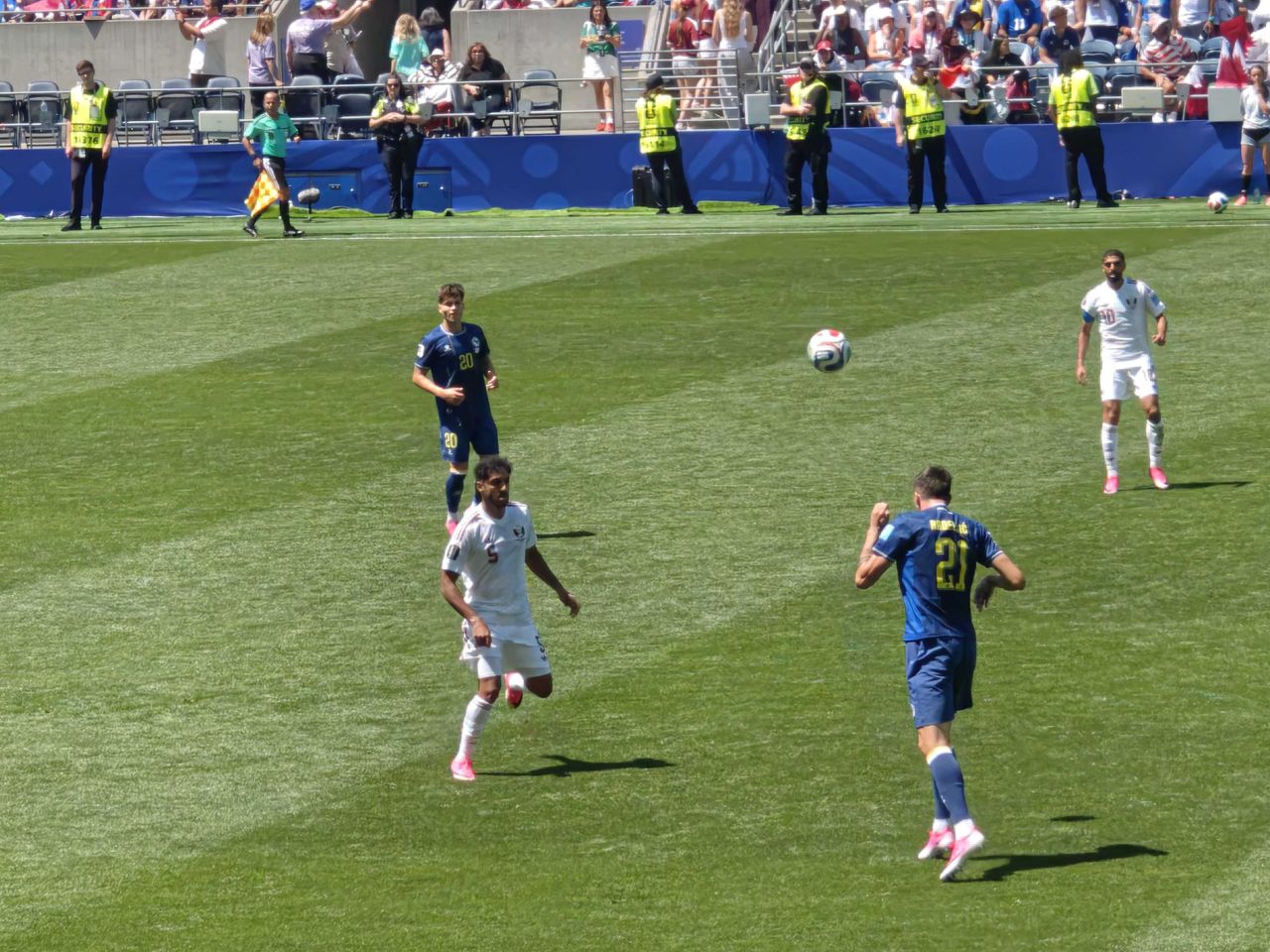 A ball bouncing off a soccer player's head
