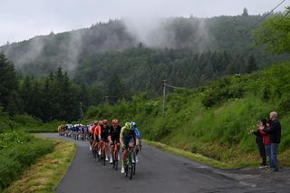 COL DE LA LOGE FRANCE JUNE 03 LR Ben Turner of The United Kingdom Joshua Tarling of The United Kingdom and Team INEOS Grenadiers and Nico Denz of Germany and Team BORA hansgrohe lead the peloton during the 76th Criterium du Dauphine 2024 Stage 2 a 142km stage from Gannat to Col de la Loge 1251m UCIWT on June 03 2024 in Col de la Loge France Photo by Dario BelingheriGetty Images