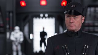 Adrian Edmondson stands in First Order uniform in Star Wars: The Last Jedi.