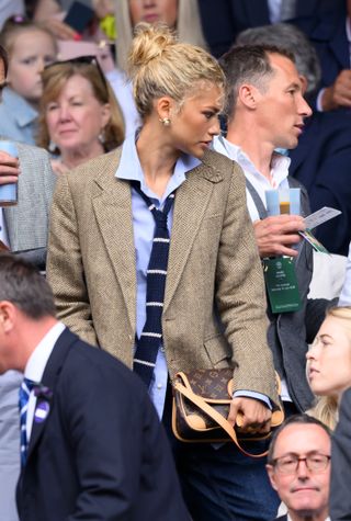 LONDON, ENGLAND - JULY 13: Zendaya, wearing Ralph Lauren,, wearing Ralph Lauren, court-side of Centre court on day thirteen of the Wimbledon Tennis Championships at the All England Lawn Tennis and Croquet Club on July 13, 2024 in London, England. (Photo by Karwai Tang/WireImage)