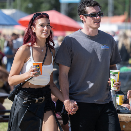 Dua Lipa and Callum Turner during day four of Glastonbury Festival 2024 at Worthy Farm, Pilton on June 29, 2024 in Glastonbury, England.