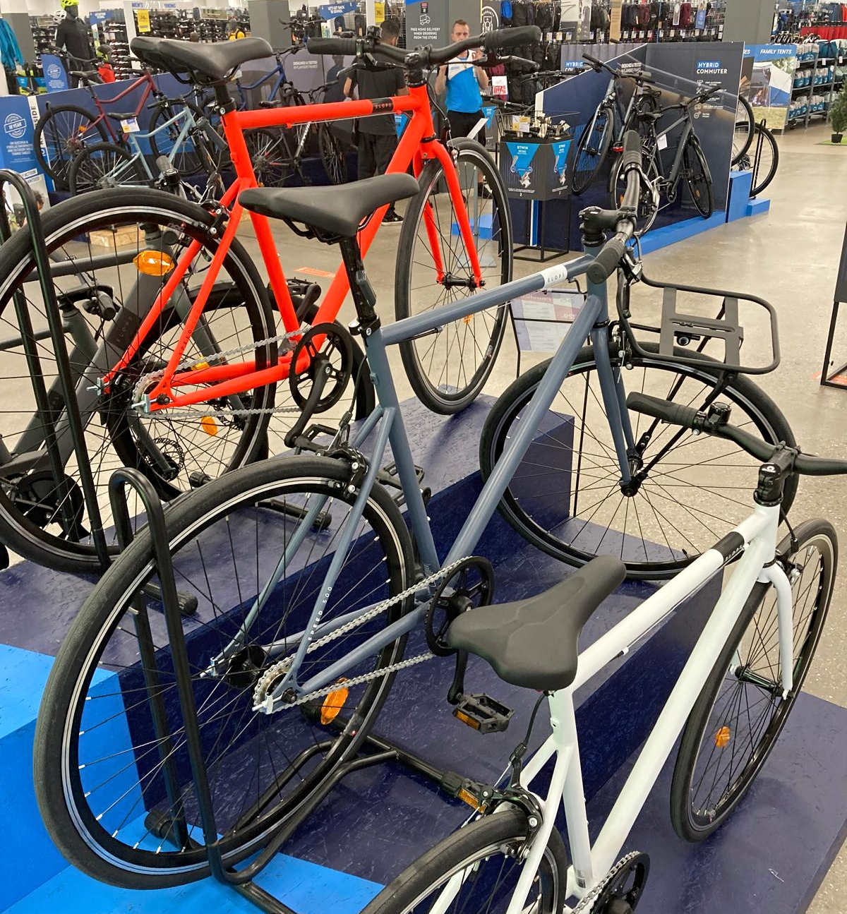 Three bikes in a Decathlon store