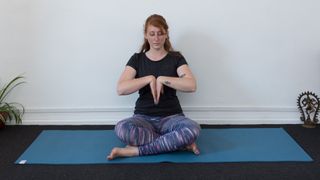 yoga energy sequence: wrist stretch