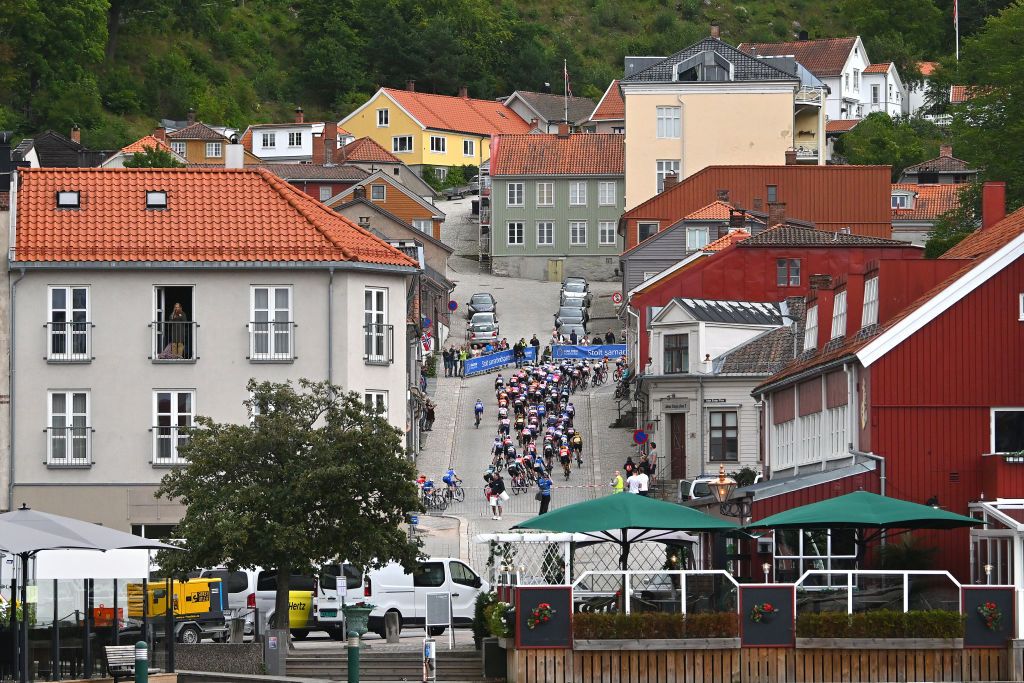 HALDEN NORWAY AUGUST 23 A general view of the peloton passing through Halden Village during the 9th Tour of Scandinavia 2023 Battle Of The North Stage 1 a 1246km stage from Mysen to Halden UCIWWT on August 23 2023 in Halden Norway Photo by Luc ClaessenGetty Images