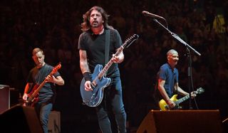 (from left) Nate Mendel, Dave Grohl and Pat Smear perform with the Foo Fighters on June 20, 2021 at Madison Square Garden in New York City