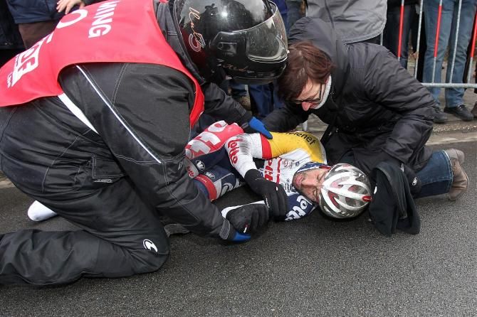 Handzame Classic winner Kenny Dehaes is attended to after he crashed moments after crossing the finish line.