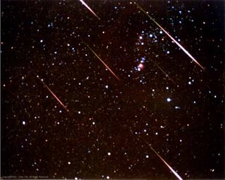 Leonid meteors move so fast that the air in front of the meteor is compressed and heated by ram pressure, the heated air scorches the meteor.