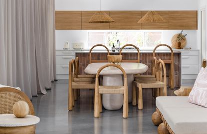a kitchen diner with chunky wooden furniture
