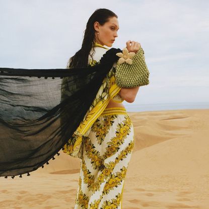 Model wearing matching Harvey Nichols beachwear.