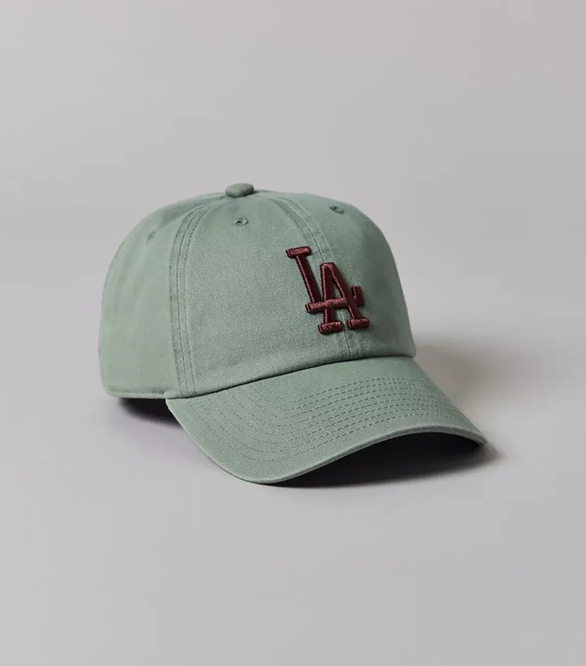 green baseball cap
