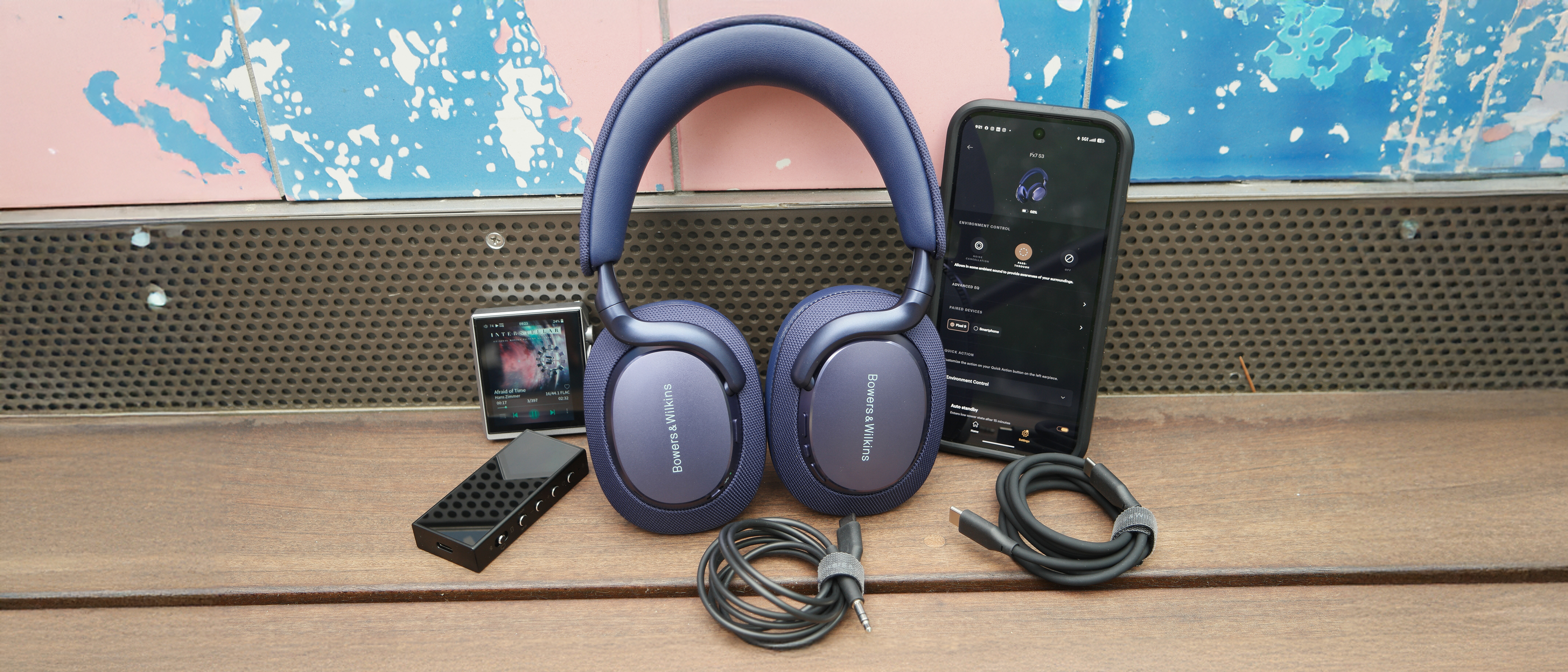 Bowers & Wilkins Px7 S3 on a deck, in the middle of a Google phone, a Hidisz DAP, and Questyle DAC