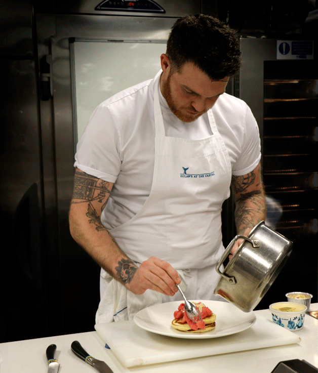 Chef Tom Brown plates up the pancakes