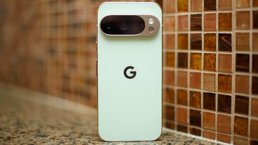 Google Pixel 10 Pro in Jade with checkered tile backsplash background