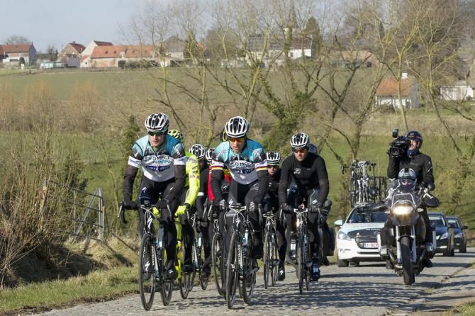 A camera crew tags along with Omega Pharma-Quick Step riders as they preview the Omloop Het Nieuwsblad course.