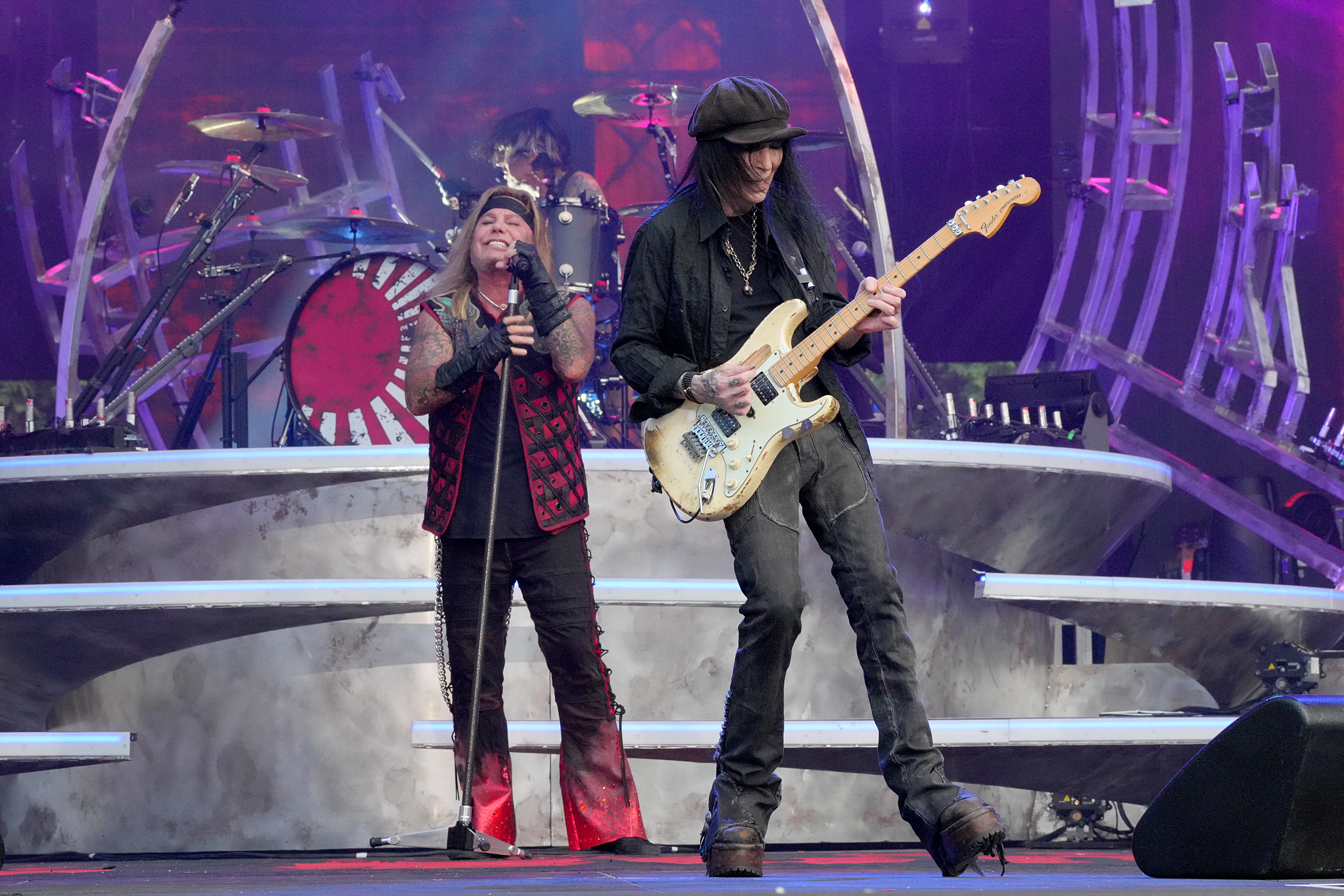Vince Neil and Mick Mars of M&amp;ouml;tley Cr&amp;uuml;e perform onstage during The Stadium Tour at Truist Park on June 16, 2022 in Atlanta, Georgia