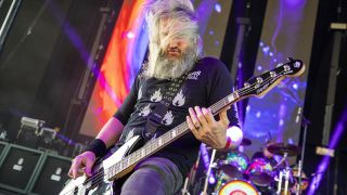 Troy Sanders of Mastadon performs at Michigan Lottery Amphitheatre at Freedom Hill on June 11, 2019 in Sterling Heights, Michigan.