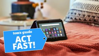 Amazon Fire Tablet 2022 pictured on bed