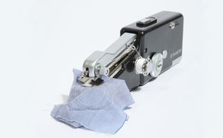 Handheld sewing machine