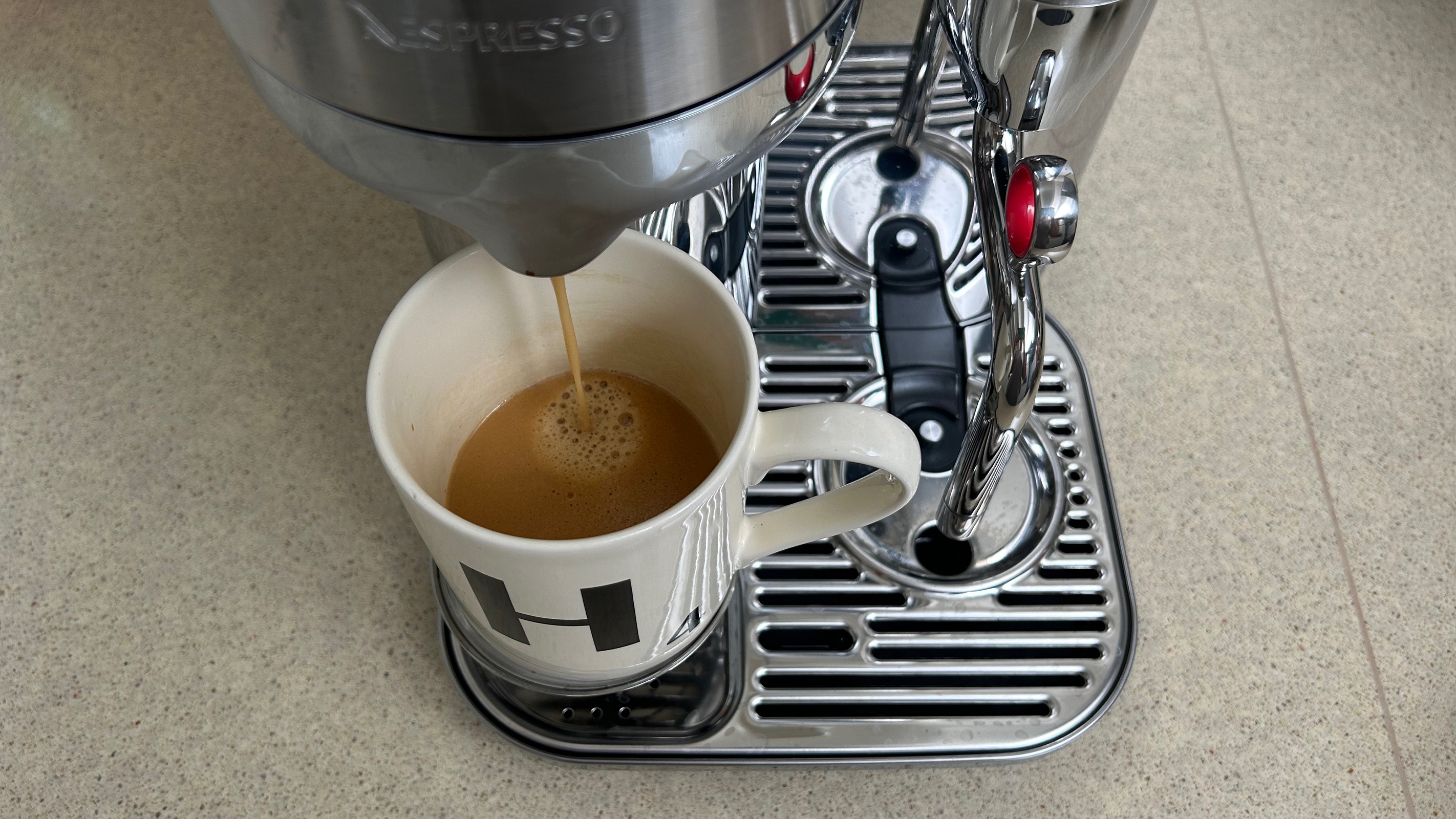 Nespresso Vertuo Creatista pouring coffee