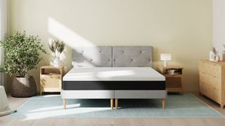 The Emma NextGen Cooling Mattress on a bed frame in a bedroom