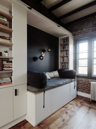 bedroom nook with black cushions