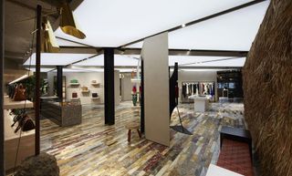 Interior design of store selling bags and clothes