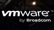 VMware by Broadcom branding in luminous white lettering against a black background, pictured at the company's vendor stall at Mobile World Congress (MWC) 2024 in Barcelona, Spain.