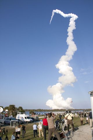 n from Launch Pad 39A at NASA's Kennedy Space Center is witnessed by news media representatives on Feb. 24, 2011.