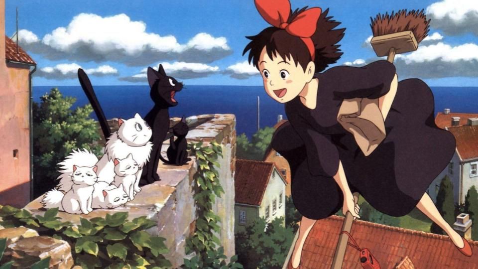 A girl rides a broomstick over a city looking a group of cats