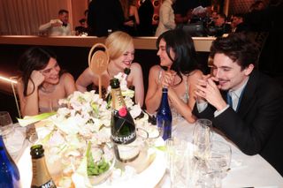 Kylie Jenner sits with the stars of a complete unknown at the 2025 golden globes