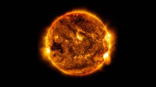 NASA’s Solar Dynamics Observatory caught an image of a mid-level solar flare emitted by the sun on Oct. 1, 2015.