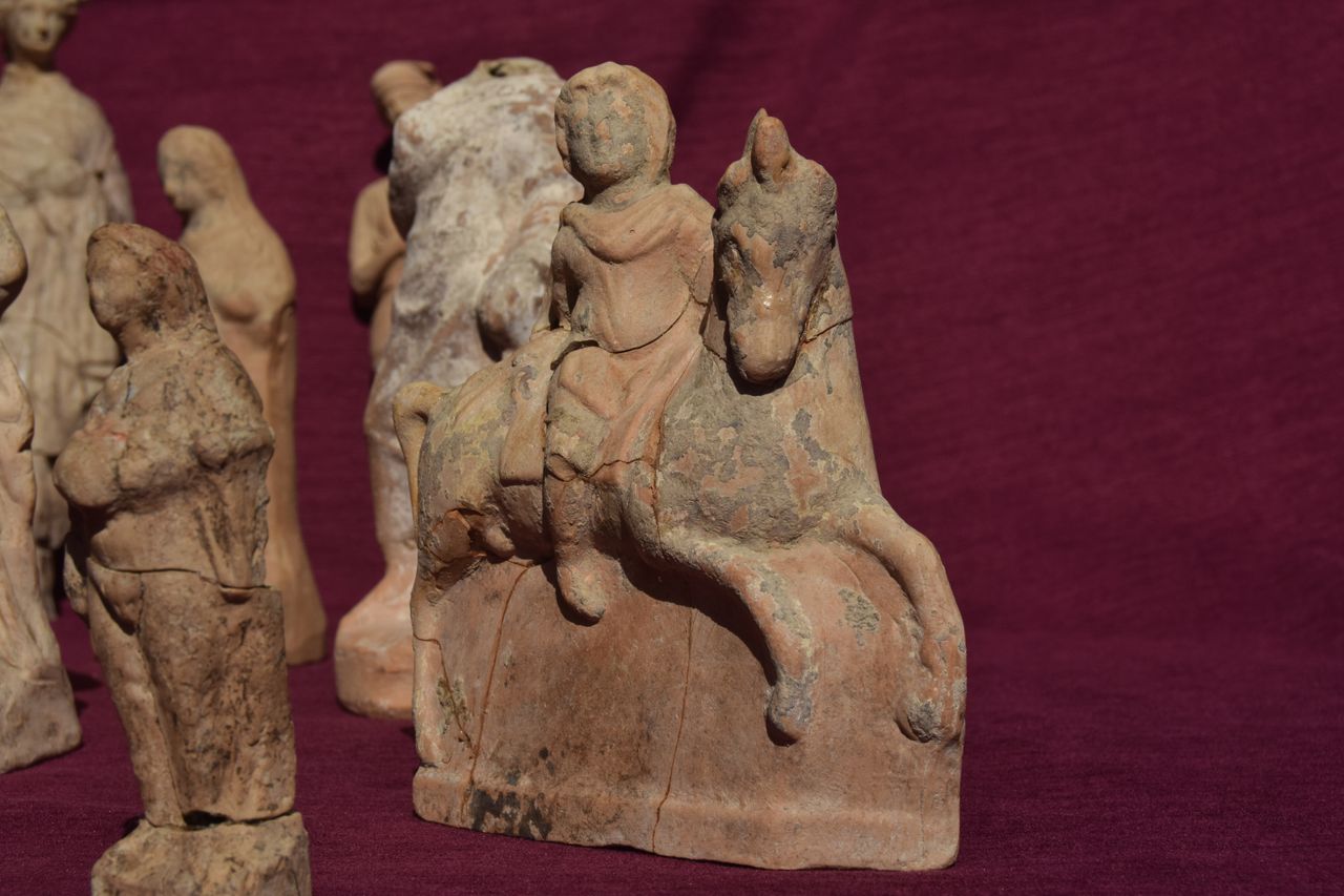 The figurines included a person riding a horse.