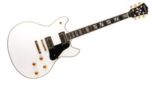 The pure white finish, gold hardware and black binding all add up to one cool-looking guitar, even if the lack of f-holes might look odd to some players