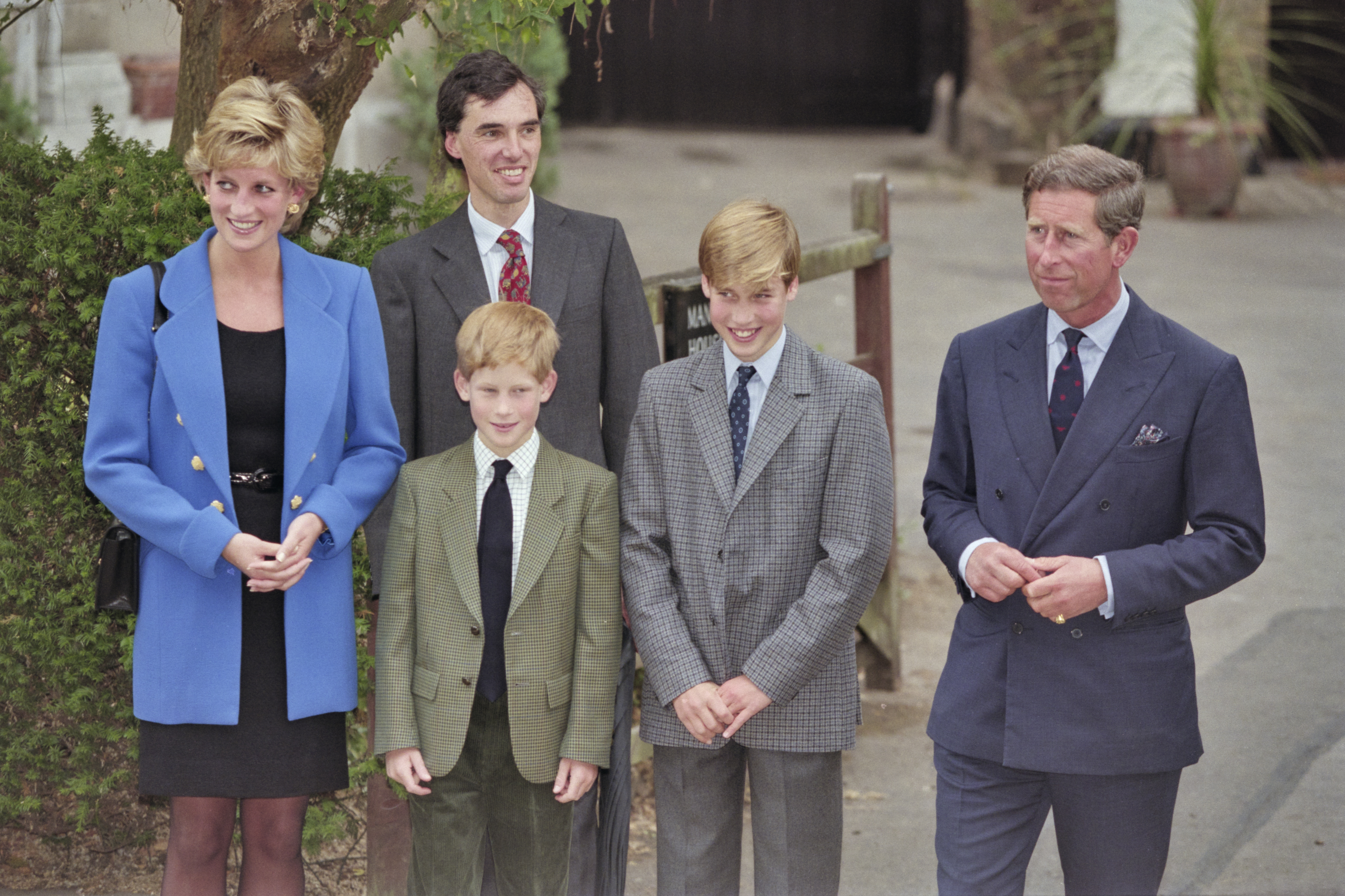 Princess Diana, Prince Charles, Prince William and Prince Harry in suits on William's first day at Eton College