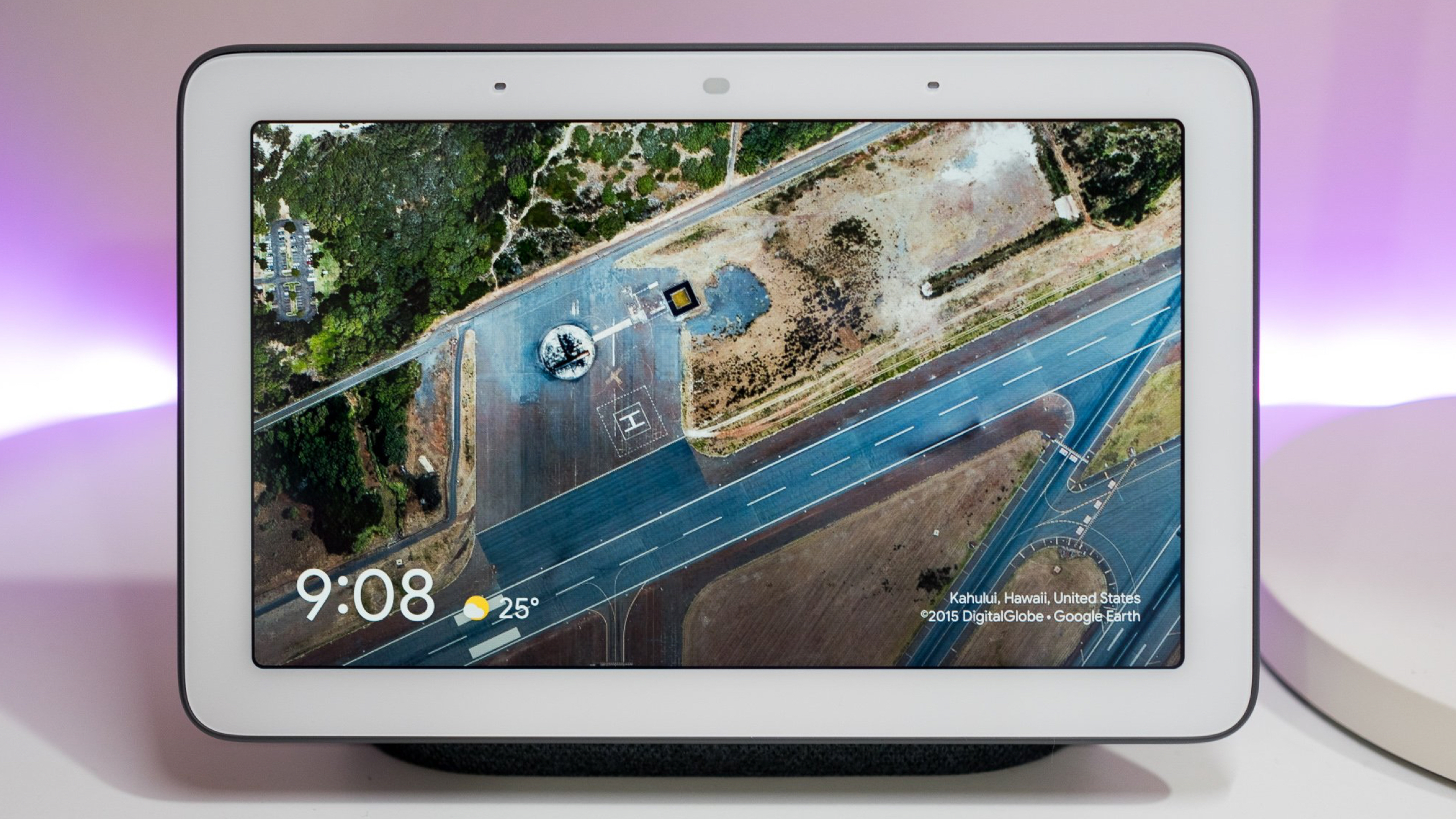 Google Nest Hub 2nd gen with time and wallpaper displayed