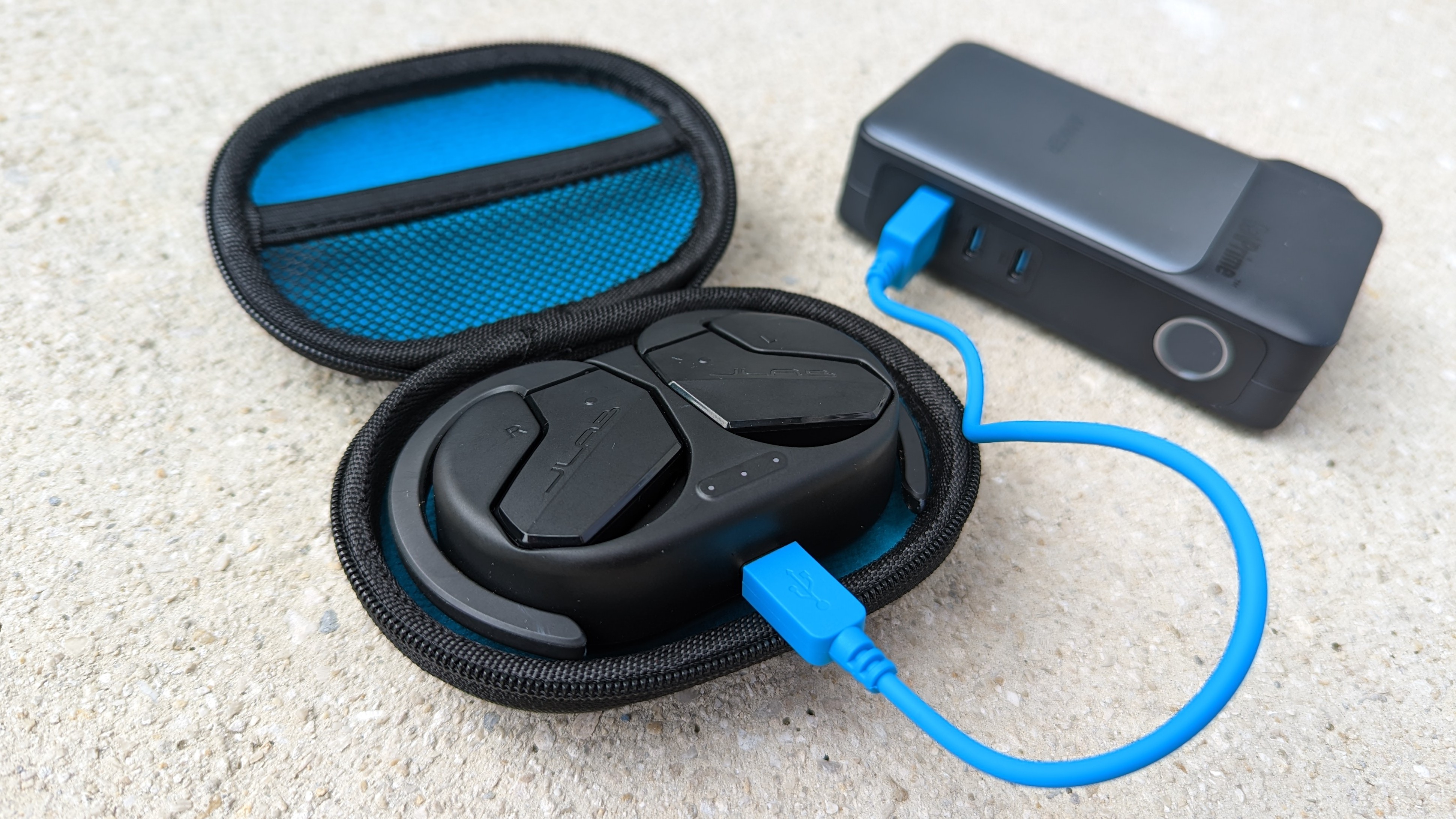 Charging the JLab Open Sport Open-Ear Wireless Earbuds