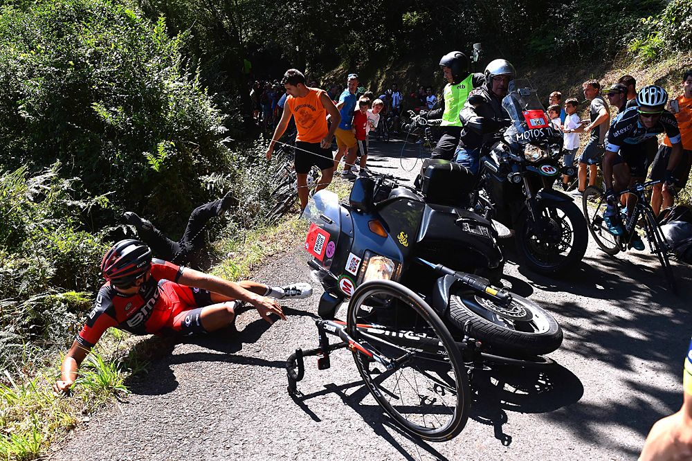Greg Van Avermaet (BMC) on the ground after behind hit from behind by a TV motorcycle at the Clasica San Sebastian