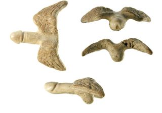 This penis is made out of animal bone and has wings on it. Phallic symbols, including versions with wings, are commonly seen throughout the Roman Empire.